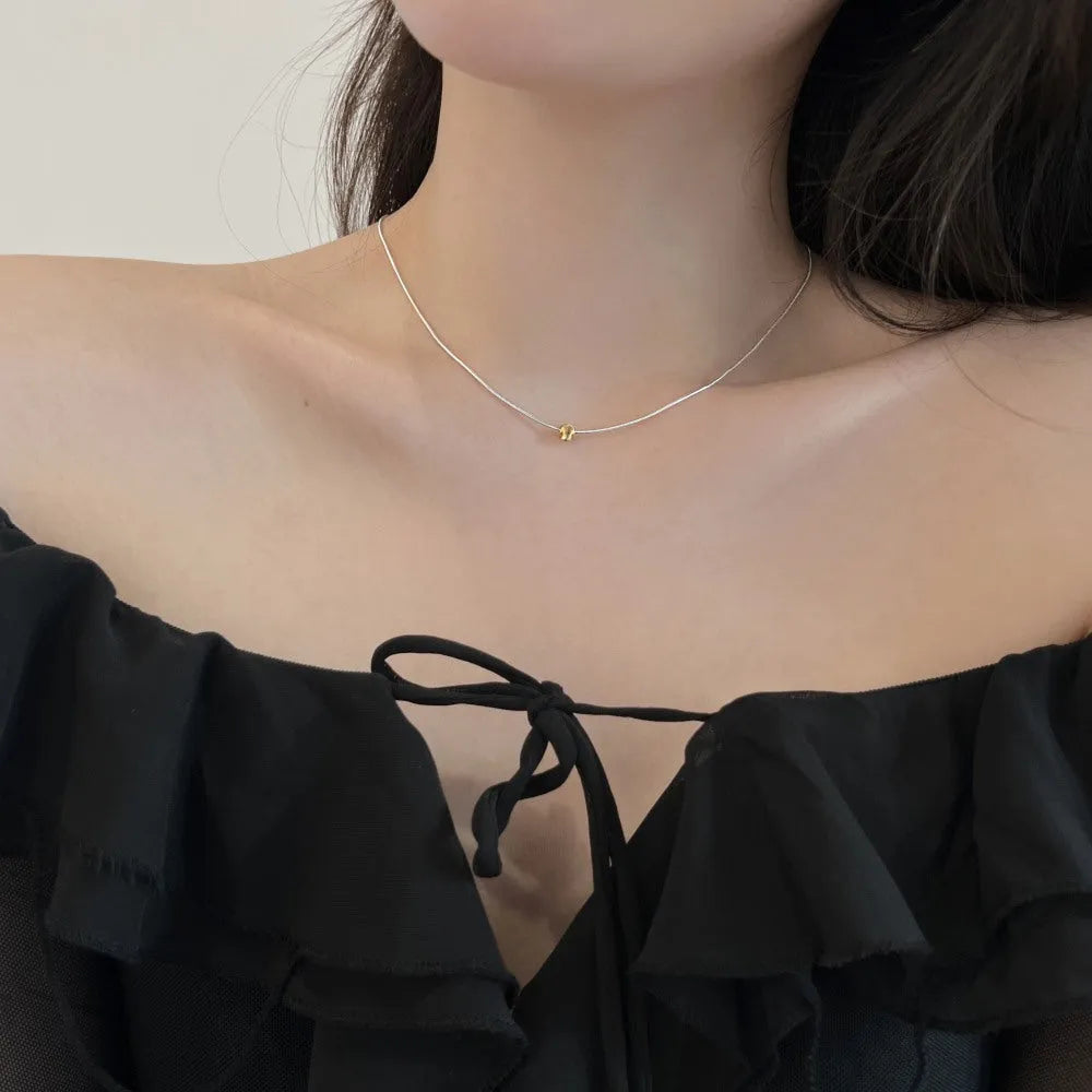 S925 sterling silver necklace for women with geometric pendant and golden balls design on a regular chain