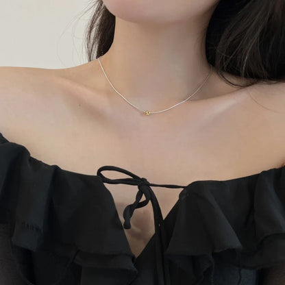 S925 sterling silver necklace for women with geometric pendant and golden balls design on a regular chain