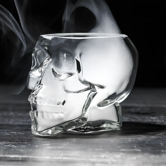 Transparent skull-shaped wine glass with detailed features and 160ml capacity measurement