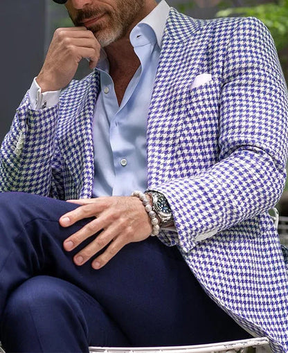 Men's slim fit two-button suit jacket with large top-stitch pockets in a polyester blend fabric.