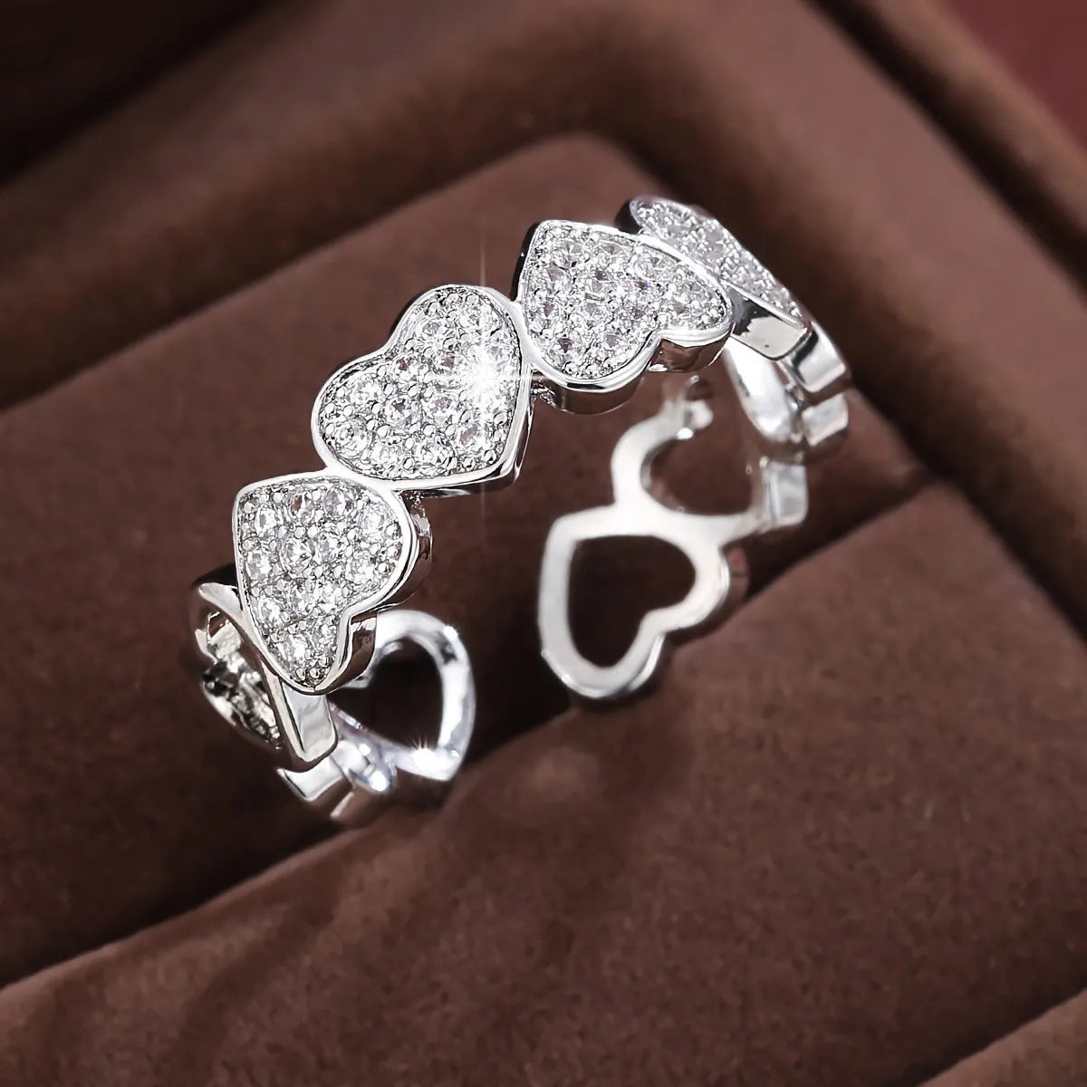 Adjustable opening couples ring with heart motif, gold and silver finishes, geometric shape, diamond treatment on copper