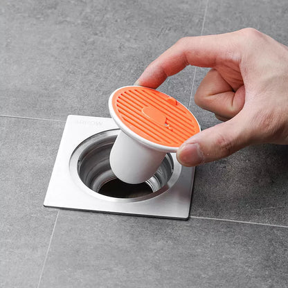 Whale Magnetic Suction Floor Drain Cover in white, orange, or green, blocking sewer odors with a tight seal
