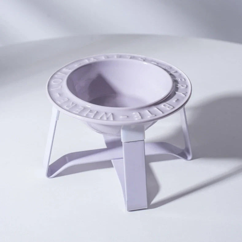 Ceramic cat bowl with iron anti-tip frame in blue colour with silicone pad