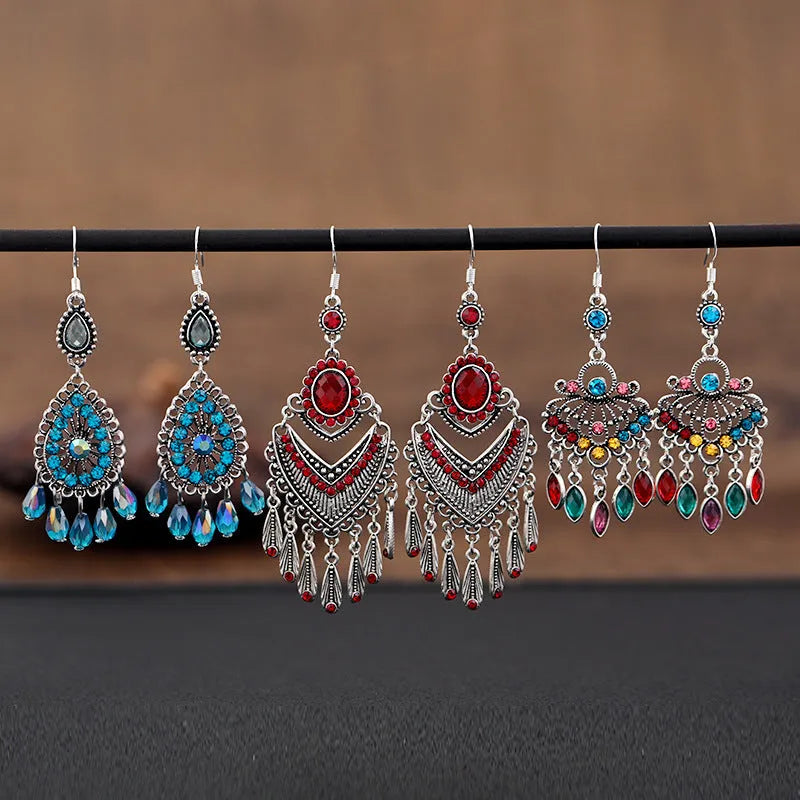 Purple long fringe drop earrings with crystals on a retro ethnic style alloy setting.