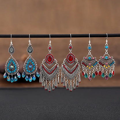 Purple long fringe drop earrings with crystals on a retro ethnic style alloy setting.