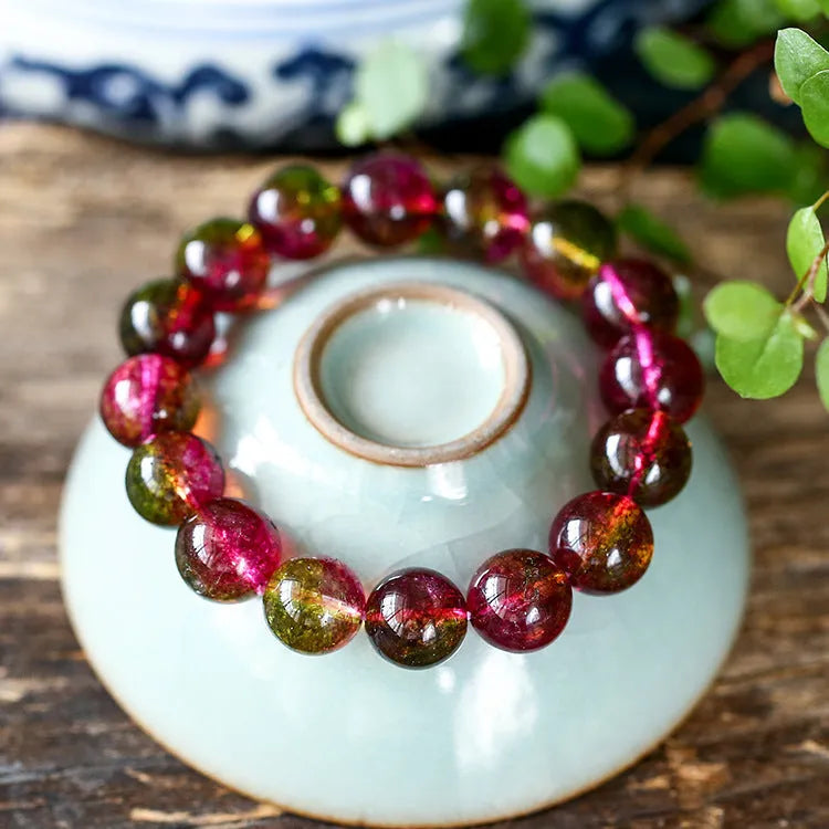 Women's personalised bracelet with hand-threaded watermelon crystal beads.
