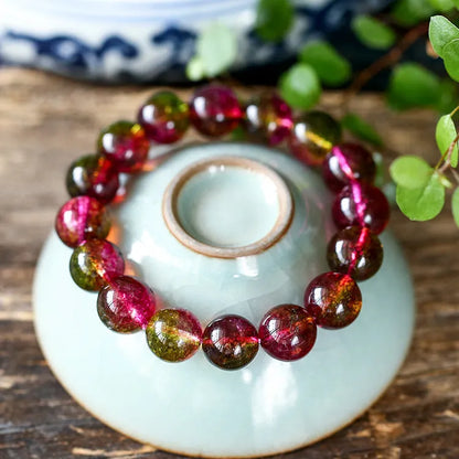 Women's personalised bracelet with hand-threaded watermelon crystal beads.