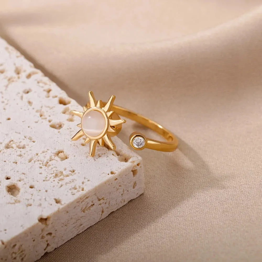 Adjustable rotatable decompression ring in gold or platinum electroplated copper