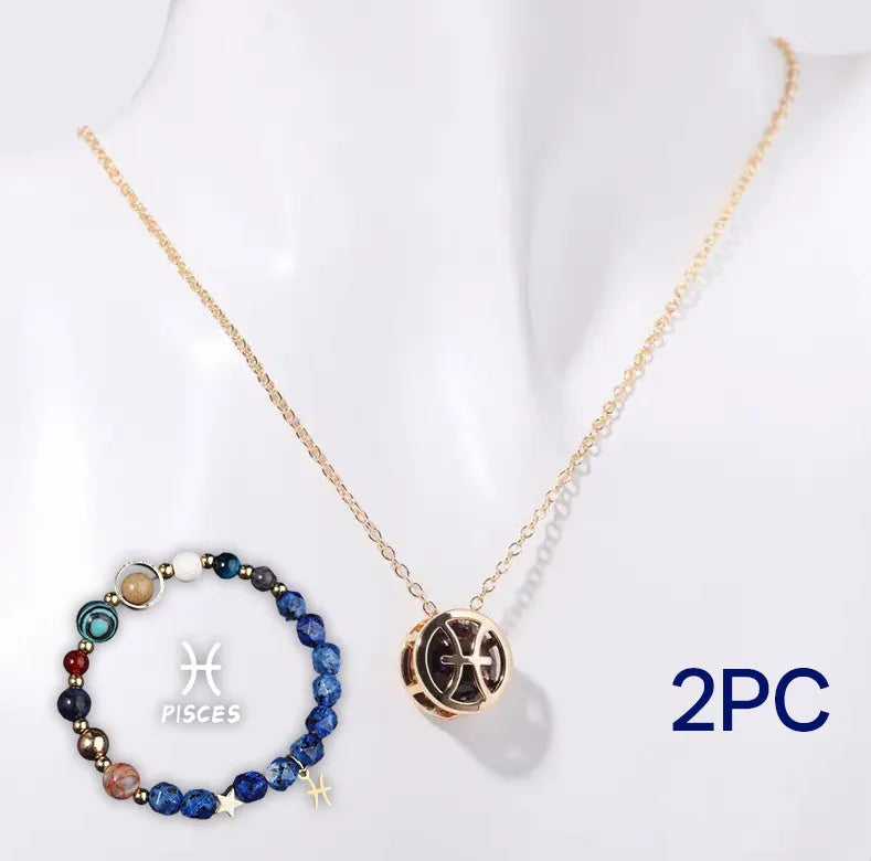 A natural stone beaded necklace and matching adjustable bracelet laid flat.