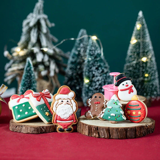 Stainless steel Christmas biscuit mold set featuring various festive shapes for holiday baking