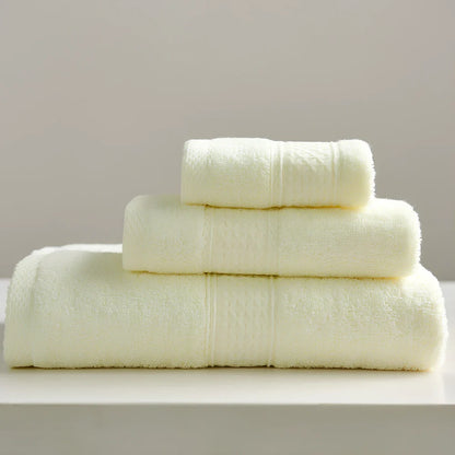Three cotton towels: 33cm square, 32cm×73cm standard, 70cm×140cm bath towel in coordinated colours