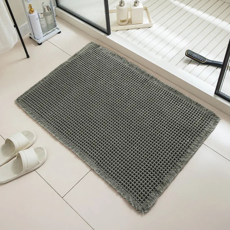 Checkered pattern non-slip bathroom carpet in beige colour with woven polyester construction