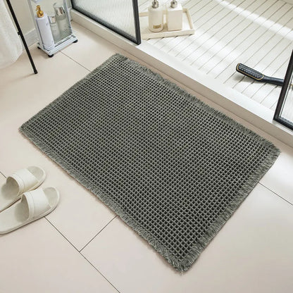 Checkered pattern non-slip bathroom carpet in beige colour with woven polyester construction