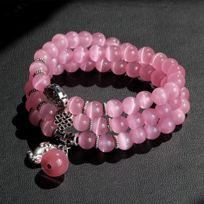 Women's opal crystal bracelet with lucky cat charm and geometric design, shown in blue colour option