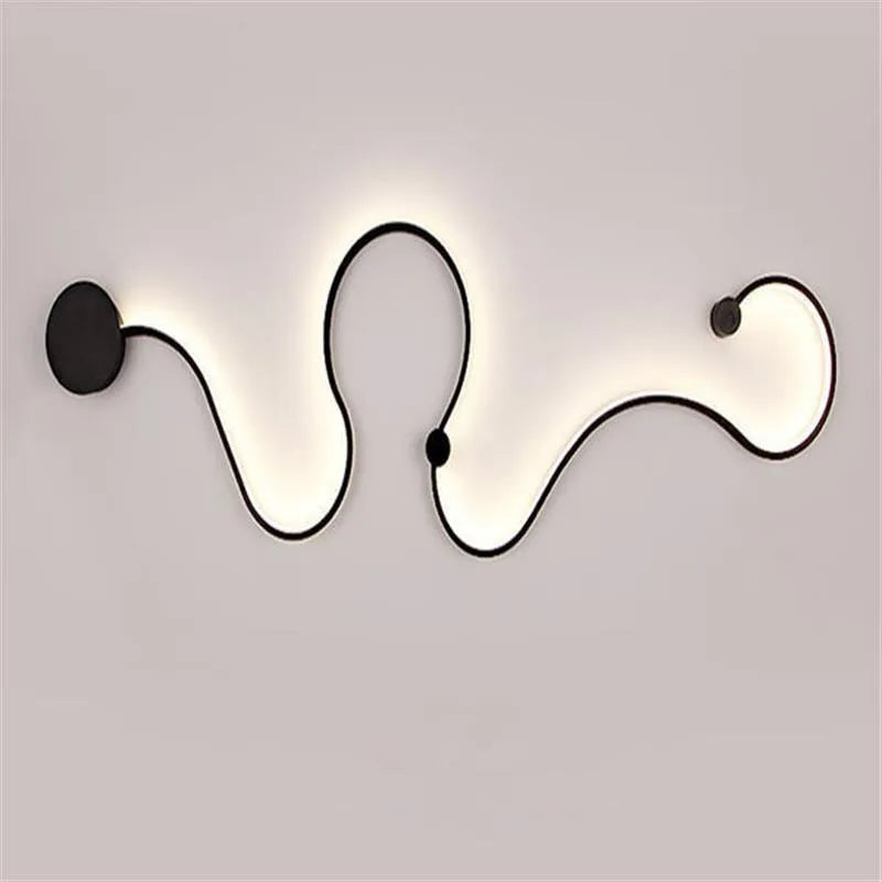 Modern black and white LED wall lamp with aluminium shade in four different sizes for bedside or corridor lighting
