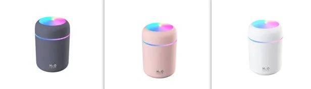 Pink car air purifying humidifier with LED lights on, next to a USB cable.
