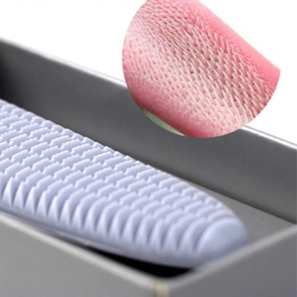 Grey and pink cat grooming comb with tongue massage design and dual-ended narrow and wide sections