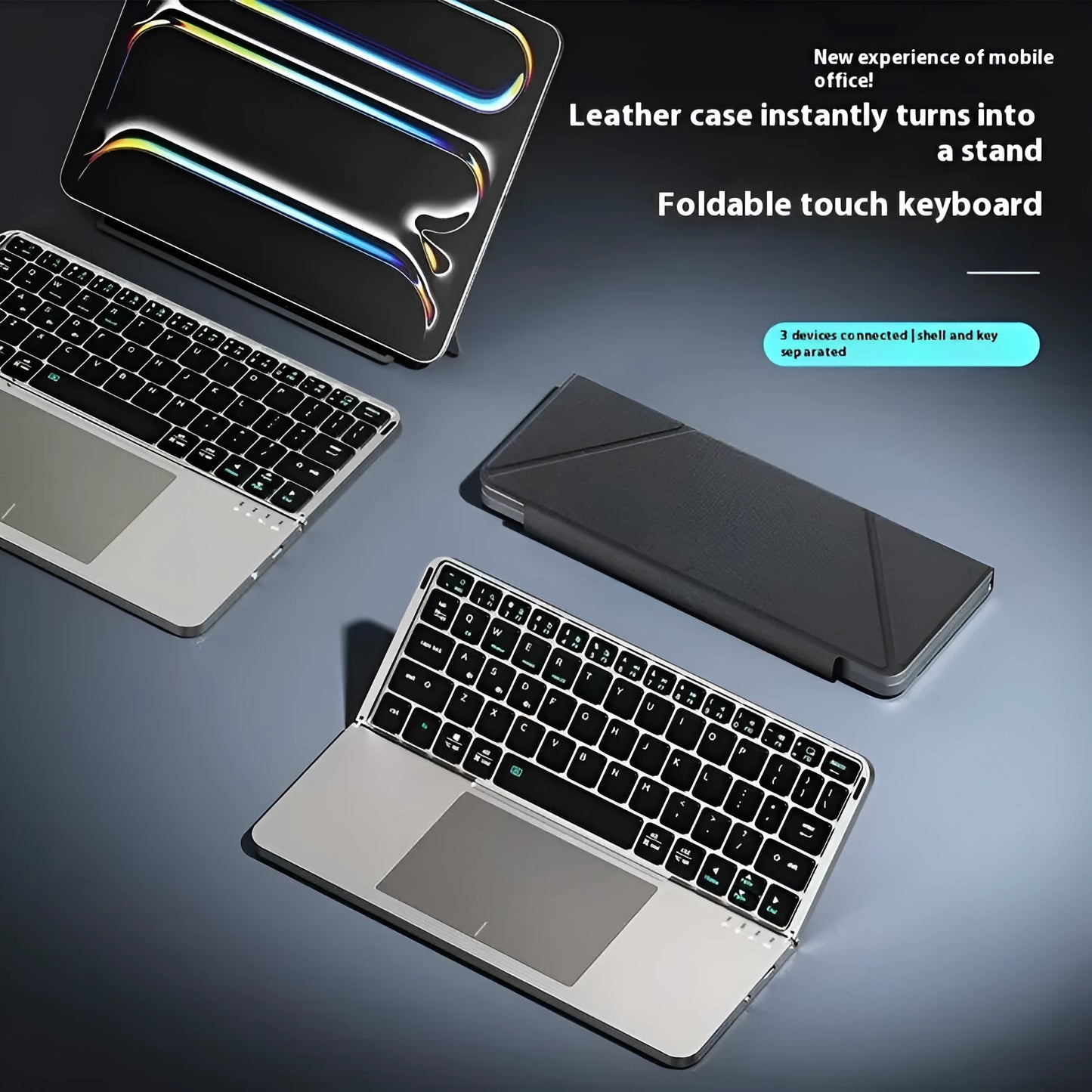 Gray wireless Bluetooth folding keyboard shown both folded to 15cm and extended to 30cm width