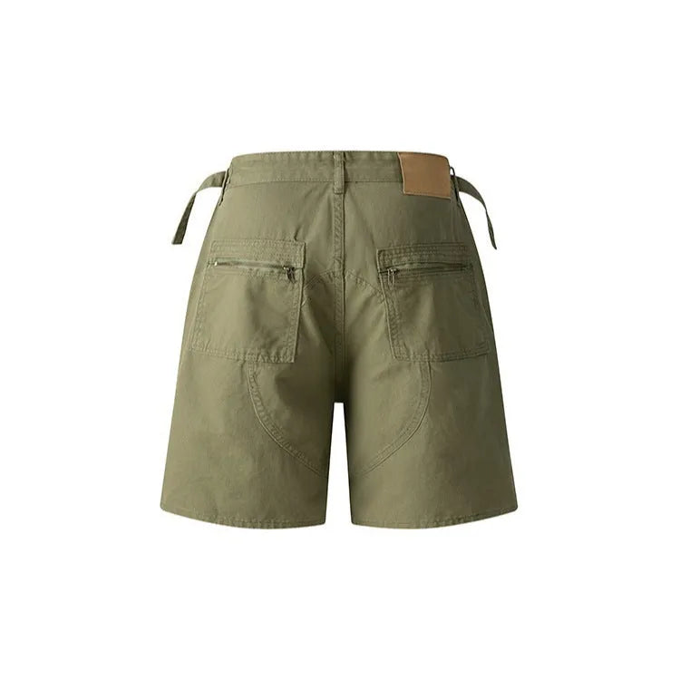 Retro loose-fit washed cotton workwear shorts in camouflage green colour with zip fly.
