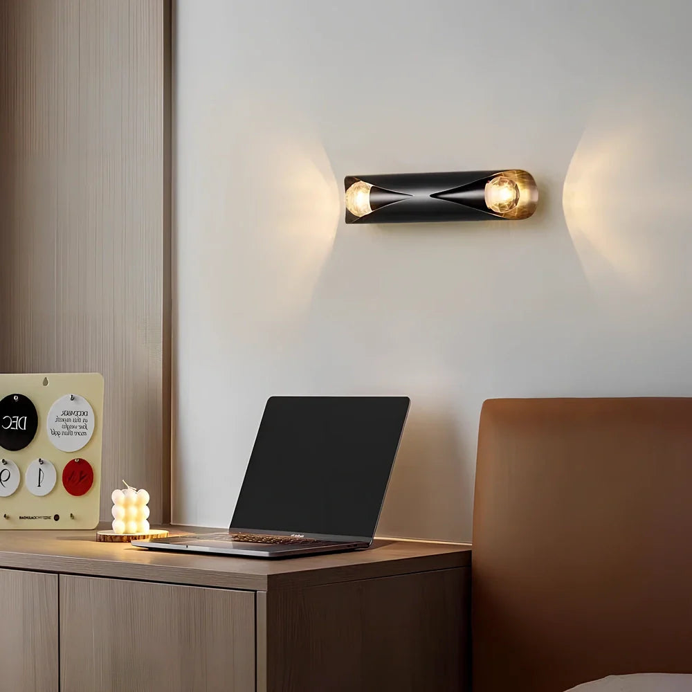 Copper wall lamp with matte black finish, 23cm × 5.5cm dimensions, warm light illumination