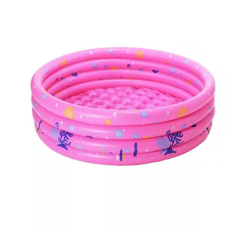 Kids playing in a colorful inflatable sea ball pool with water