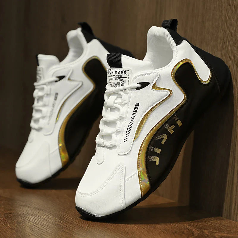 Stylish lace-up sneakers for men in colorblock design, with breathable mesh lining and lightweight, non-slip sole