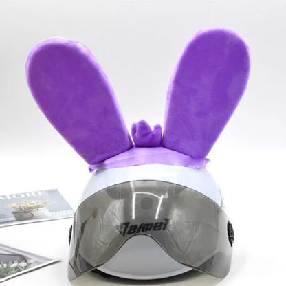 Rabbit ear ski helmet ornament with LED lighting and Velcro base attachment for helmet customisation
