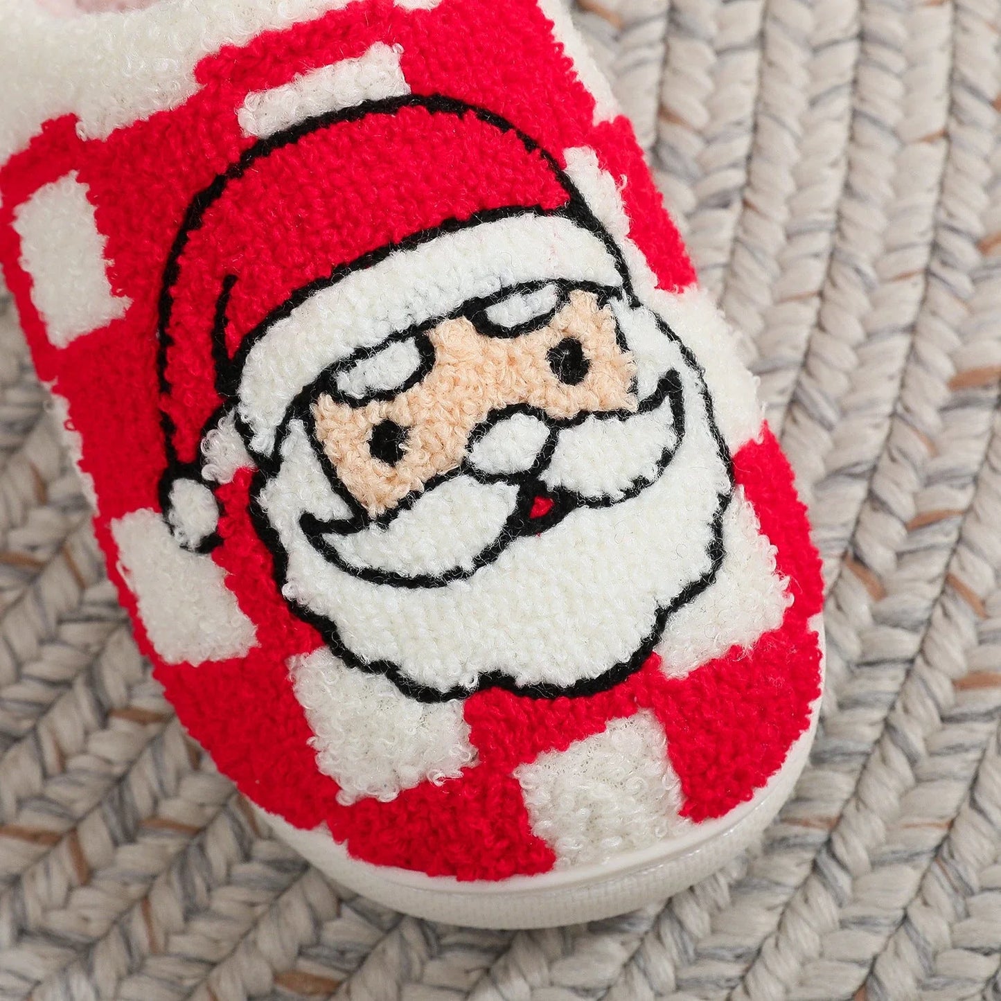 Cozy plaid Christmas slippers with soft, plush fabric and non-slip sole for indoor wear