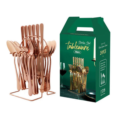 24-piece stainless steel cutlery set with knives, forks, spoons, and teaspoons on a storage rack in a gold finish.