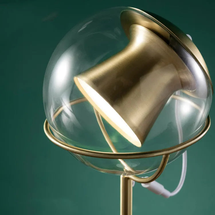 Creative glass shade desk lamp with touch dimmer switch on a wooden desk