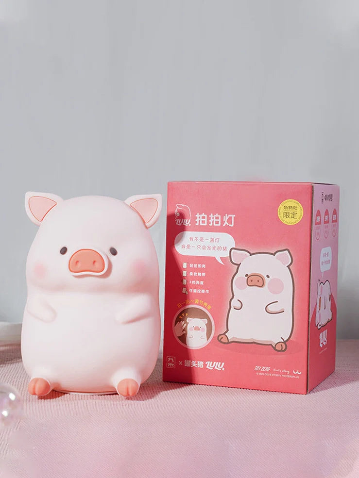 Pink silicone pig night light with USB charging cable, dimensions 180x145x130mm