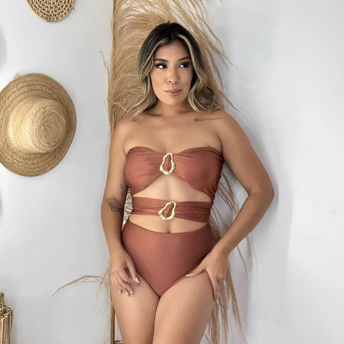 Women's solid colour one-piece swimsuit in black, brown, or red with nylon spandex lining, sizes S M L