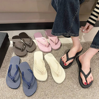 PVC injection moulded flip flops in toe-covering casual style with non-slip sole