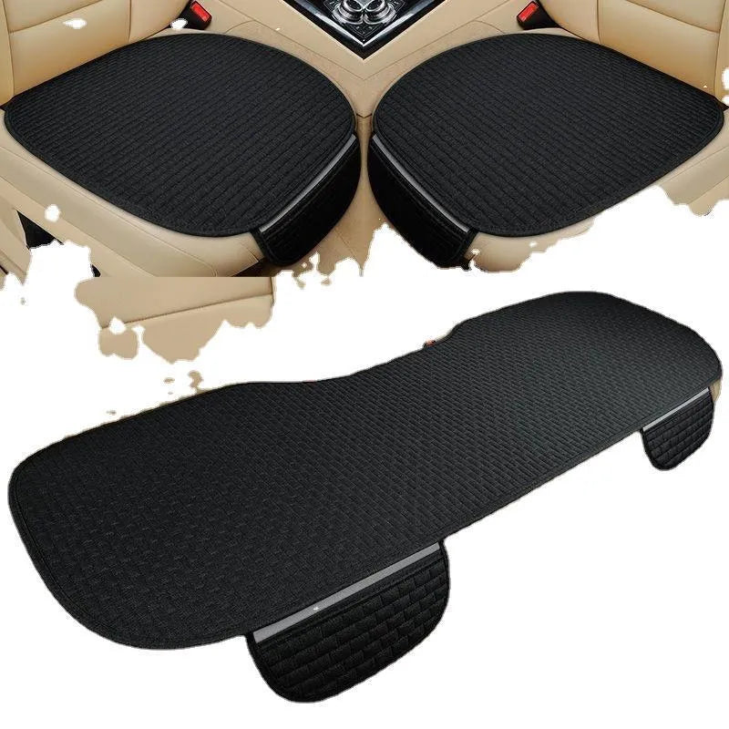 Linen car cushion with plaid pattern in cream colour on automotive seat