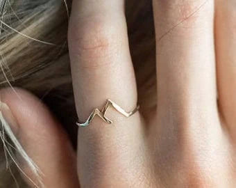 Handcrafted mountain-shaped copper ring with unique design and antibacterial properties