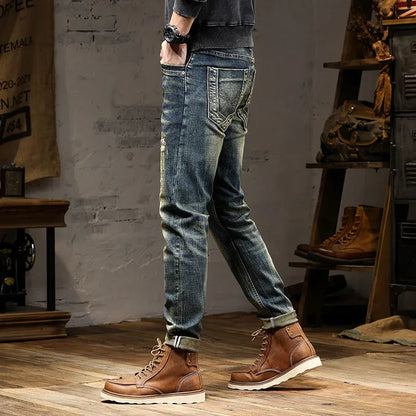 Men's skinny fit stretch denim jeans in retro colour with zip fly, shown in leisure setting.