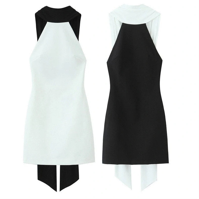 Slim-fitting black patchwork halter dress with asymmetric skirt and high waist detail