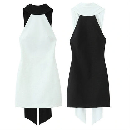 Slim-fitting black patchwork halter dress with asymmetric skirt and high waist detail