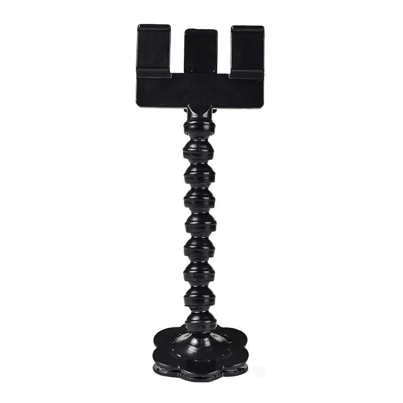 Black plastic pet photography tool attached to mobile phone with treat clip extended