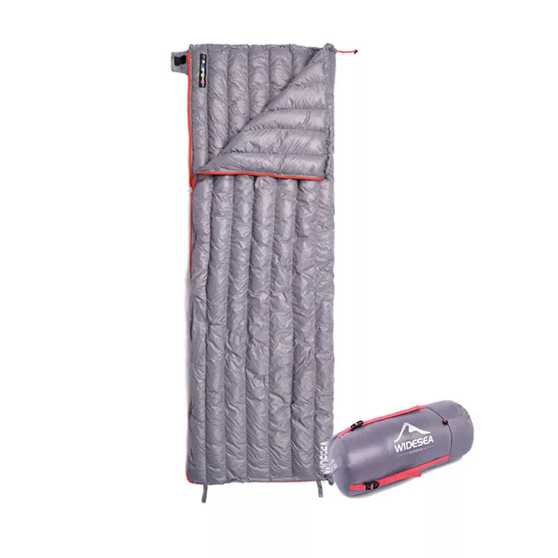 Waterproof down sleeping bag with compression storage in cyan gray