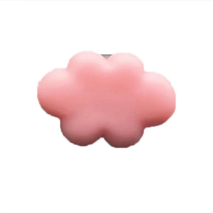 Resin car fragrance clip in light green colour showing 17mm x 27mm dimensions on car air vent