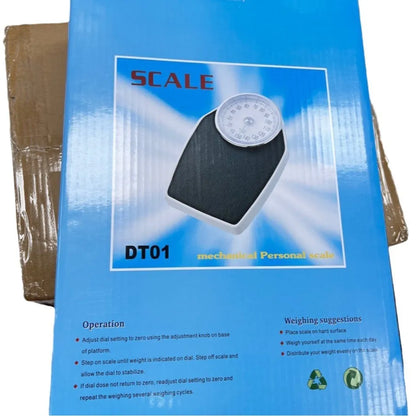 Black mechanical body weight scale with large dial, measuring 47x35x11cm