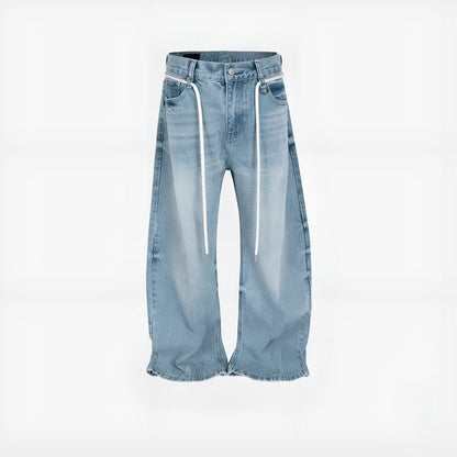 Blue vintage washed straight-leg denim trousers with a drawstring waistband on a hanger.