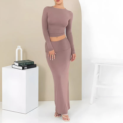 Women's black polyester two-piece suit with a sweet style, featuring a top and long skirt in a slim fit.