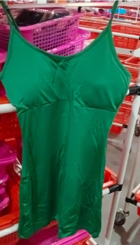 Stylish spaghetti strap jumpsuit in various vibrant colors, perfect for yoga, workouts, and everyday wear.