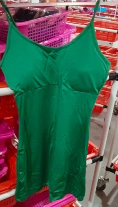 Stylish spaghetti strap jumpsuit in various vibrant colors, perfect for yoga, workouts, and everyday wear.
