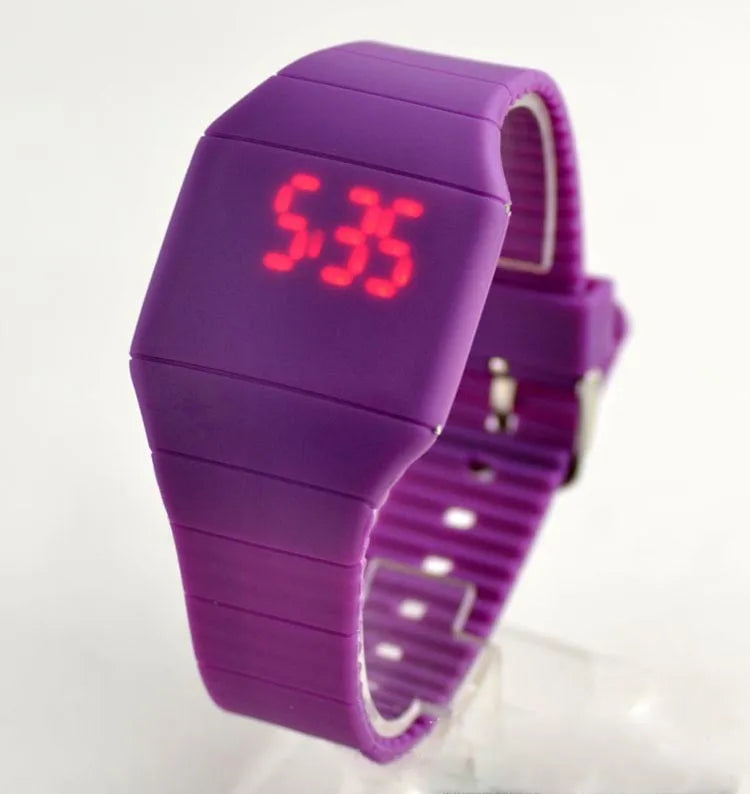 Square digital electronic watch with touch screen on a PU strap, shown in multiple colour options.