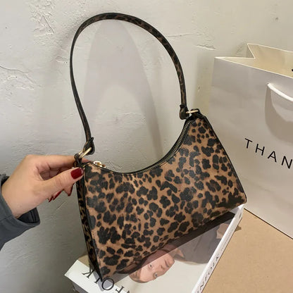 Small square women's underarm bag in multiple colour and pattern options including leopard print
