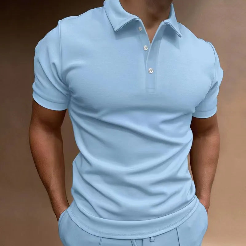 Men's grey loose-fit cotton blend t-shirt with a button detail and short sleeves.