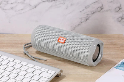 Fabric portable Bluetooth speaker with card holder in blue colour showing compact 182×73.5×69.2mm dimensions